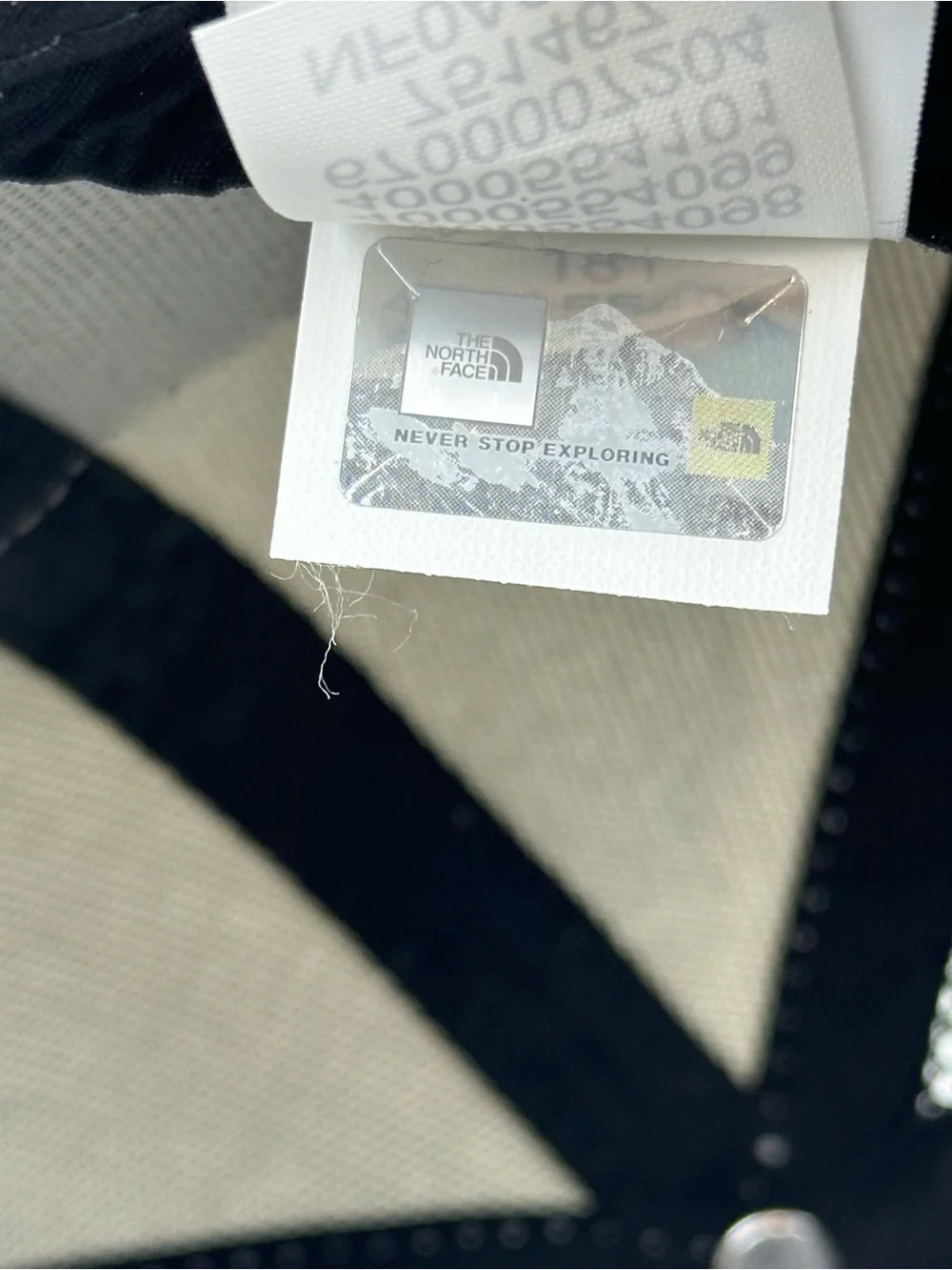 The North Face Black & White Trucker Hat with South Korea Flag Patch